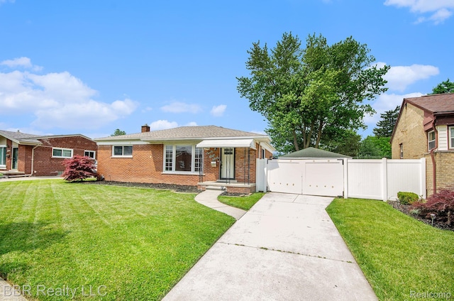2890 Maxwell St, Trenton, MI 48183 - view of front of home with brick siding, a detached garage, a chimney, and an outdoor structure