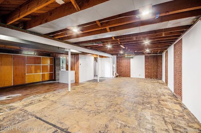 2890 Maxwell St, Trenton, MI 48183 - basement featuring brick wall