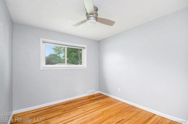 2890 Maxwell St, Trenton, MI 48183 - spare room with wood finished floors and ceiling fan
