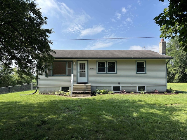 6143 Shepherd Rd, Adrian, MI 49221 - rear view of house with a chimney and entry steps