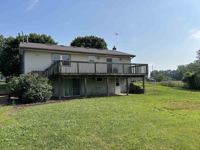6143 Shepherd Rd, Adrian, MI 49221 - rear view of house featuring a wooden deck and a lawn