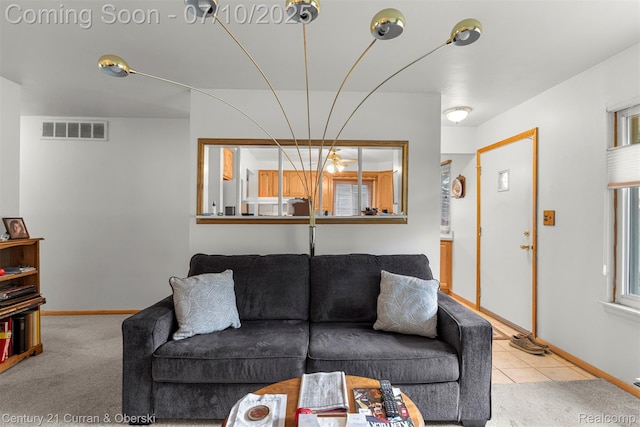 25416 Yale St S, Dearborn Heights, MI 48125 - carpeted living area featuring baseboards and tile patterned flooring