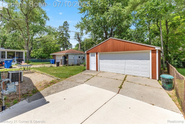 25416 Yale St S, Dearborn Heights, MI 48125 - detached garage with view of wooded area