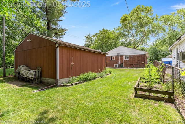 25416 Yale St S, Dearborn Heights, MI 48125 - view of yard with a garden and an outbuilding