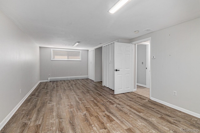 2145 Helmsford Dr, Wolverine Lake, MI 48390 - basement featuring wood finished floors