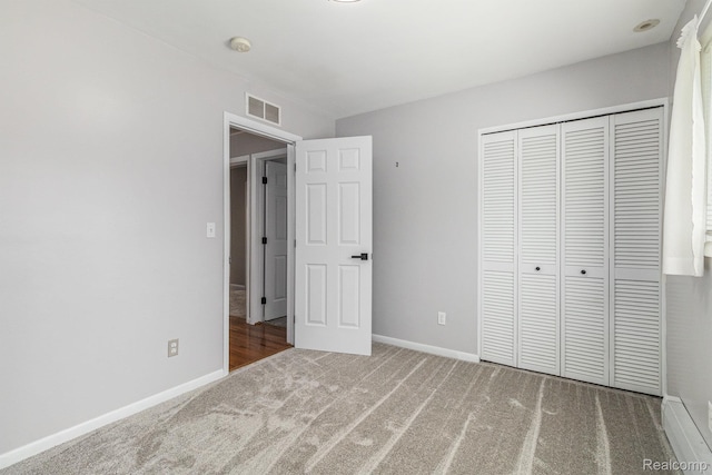 2145 Helmsford Dr, Wolverine Lake, MI 48390 - unfurnished bedroom featuring carpet and a closet