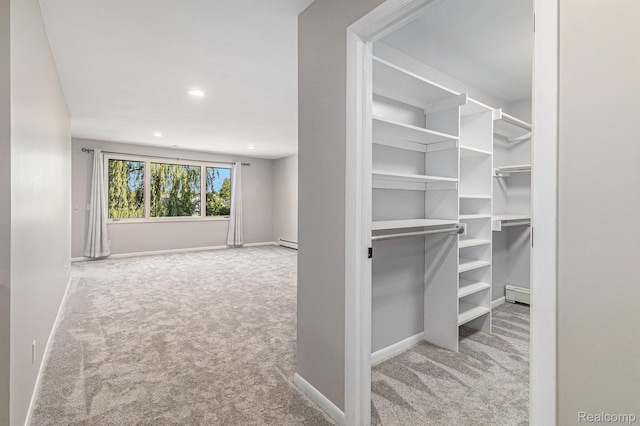 2145 Helmsford Dr, Wolverine Lake, MI 48390 - walk in closet featuring carpet floors and baseboard heating