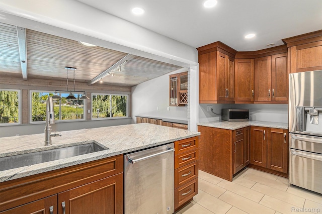 2145 Helmsford Dr, Wolverine Lake, MI 48390 - kitchen featuring stainless steel appliances, light tile patterned flooring, light stone countertops, brown cabinetry, and recessed lighting