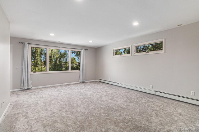 2145 Helmsford Dr, Wolverine Lake, MI 48390 - spare room with carpet flooring, baseboard heating, and recessed lighting