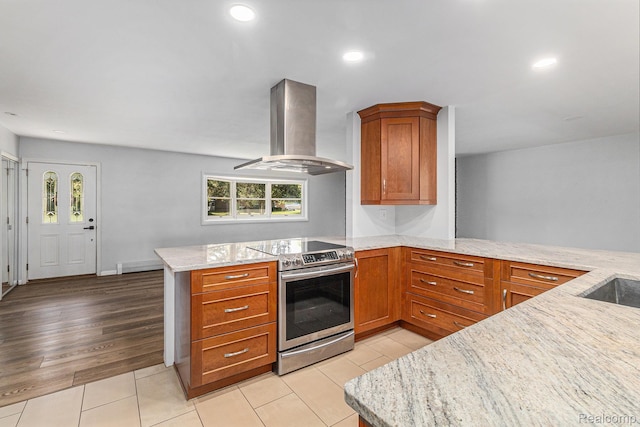2145 Helmsford Dr, Wolverine Lake, MI 48390 - kitchen featuring wall chimney exhaust hood, stainless steel range with electric cooktop, a peninsula, light stone counters, and recessed lighting