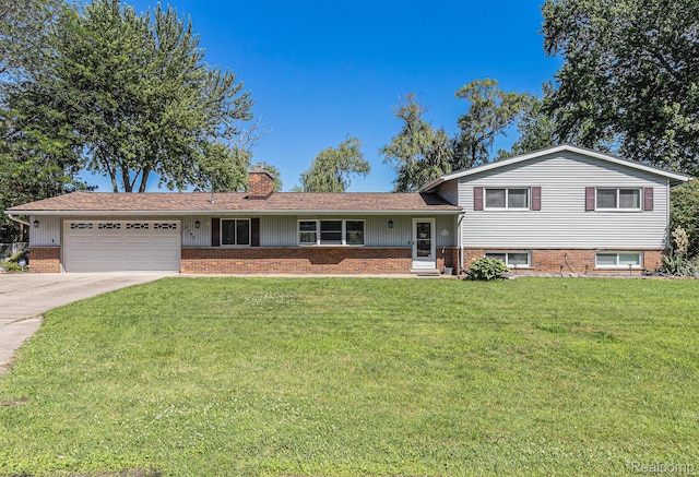 2145 Helmsford Dr, Wolverine Lake, MI 48390 - split level home featuring a garage, a chimney, a front lawn, brick siding, and concrete driveway