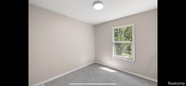 19704 Saint Aubin St, Detroit, MI 48234 - carpeted spare room featuring baseboards