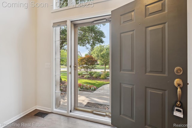 47451 Wallingford Ct, Canton, MI 48188 - foyer featuring baseboards and wood finished floors