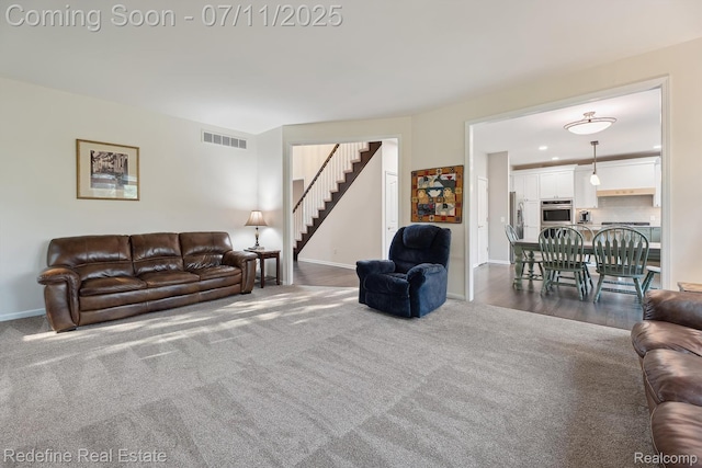 47451 Wallingford Ct, Canton, MI 48188 - living room with stairs and dark colored carpet