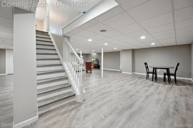 47451 Wallingford Ct, Canton, MI 48188 - finished basement with stairway, wood finished floors, recessed lighting, and a drop ceiling