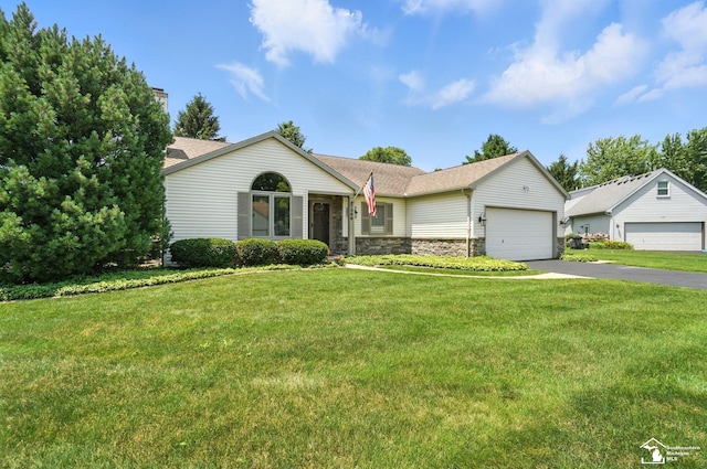 7369 Apple Grove Ln, Temperance, MI 48182 - ranch-style house with stone siding, a front lawn, a garage, and driveway