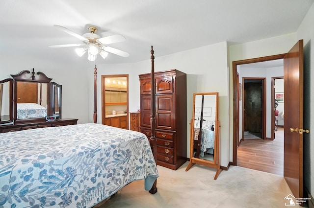 7369 Apple Grove Ln, Temperance, MI 48182 - bedroom featuring light colored carpet, ensuite bathroom, and ceiling fan