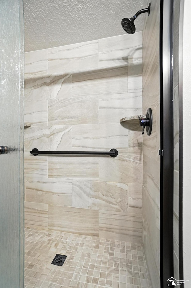 7369 Apple Grove Ln, Temperance, MI 48182 - full bathroom featuring a stall shower and a textured ceiling