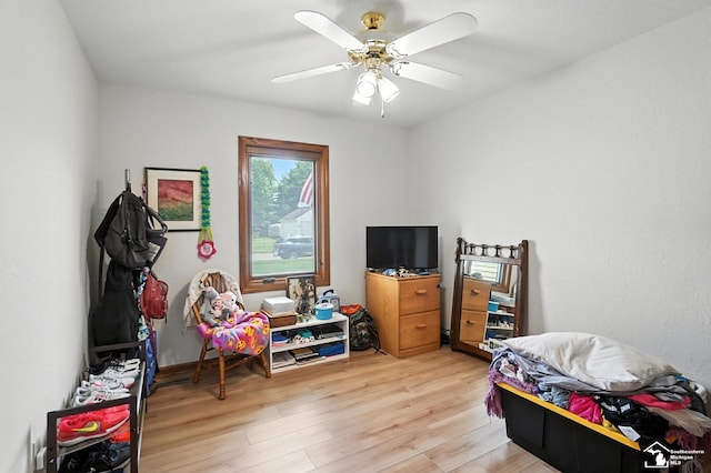 7369 Apple Grove Ln, Temperance, MI 48182 - bedroom with light wood-style floors and a ceiling fan
