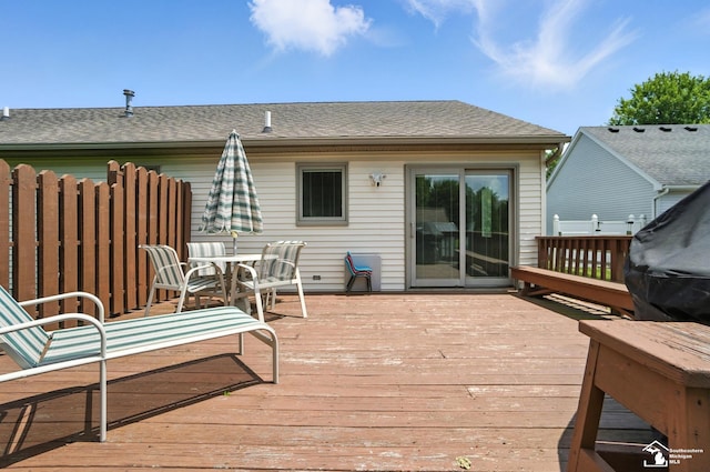 7369 Apple Grove Ln, Temperance, MI 48182 - wooden deck featuring outdoor dining area