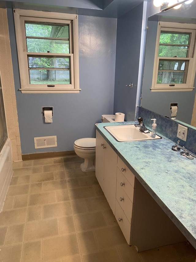 6832 Oakland Dr, Portage, MI 49024 - bathroom featuring vanity and toilet