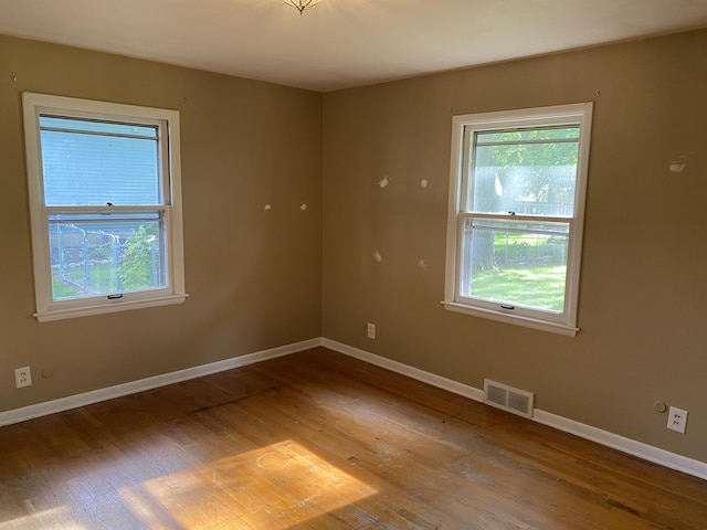 6832 Oakland Dr, Portage, MI 49024 - empty room with wood finished floors