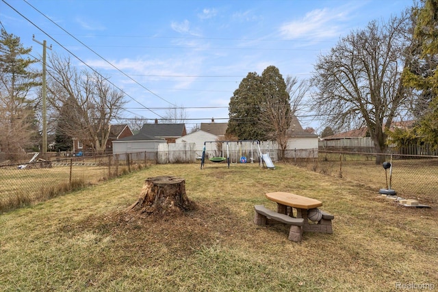 18291 Henry St, Melvindale, MI 48122 - fenced backyard featuring a playground