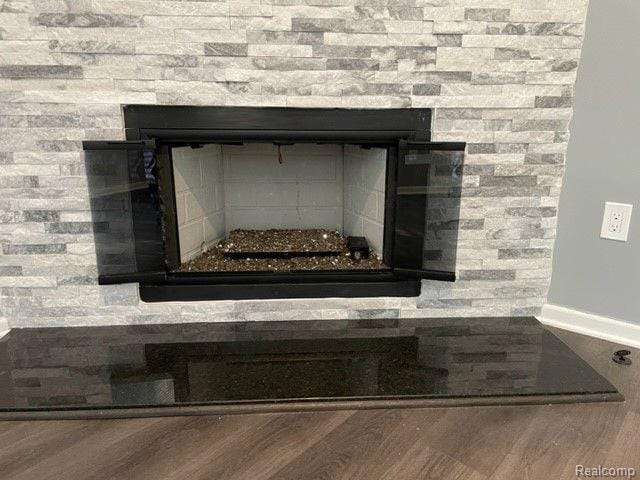1530 Maryland Club Dr, Royal Oak, MI 48067 - detailed view of a fireplace and wood finished floors