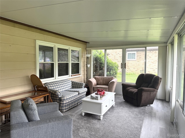 25830 Matilda Ave, Trenton, MI 48134 - sunroom / solarium featuring an outdoor hangout area, healthy amount of natural light, wood finished floors, and wood walls
