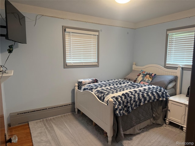 25830 Matilda Ave, Trenton, MI 48134 - bedroom featuring a baseboard radiator and light wood-style flooring