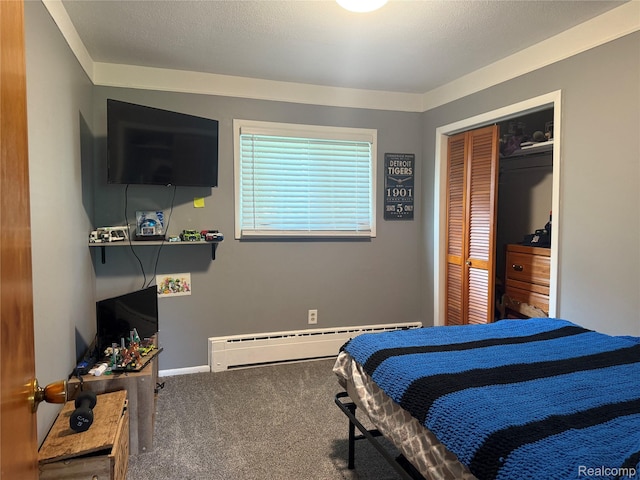 25830 Matilda Ave, Trenton, MI 48134 - bedroom with a baseboard heating unit, carpet, and a closet