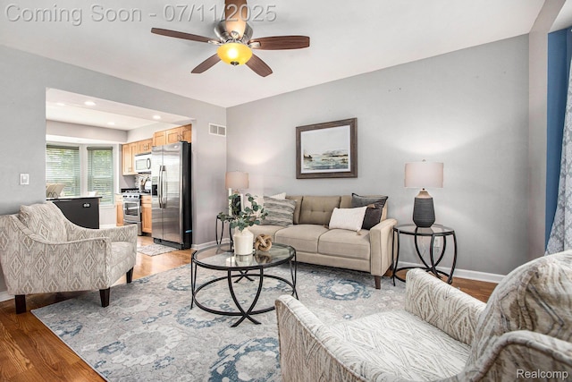 45209 Greenbriar Dr, Van Buren, MI 48111 - living room featuring a ceiling fan, light wood finished floors, and recessed lighting