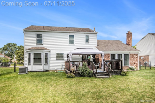 45209 Greenbriar Dr, Van Buren, MI 48111 - rear view of property featuring a gazebo, a wooden deck, roof with shingles, and brick siding