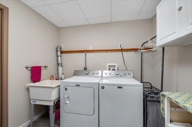 14165 Crampton Rd, Camden, MI 49232 - laundry room featuring washing machine and clothes dryer and cabinet space