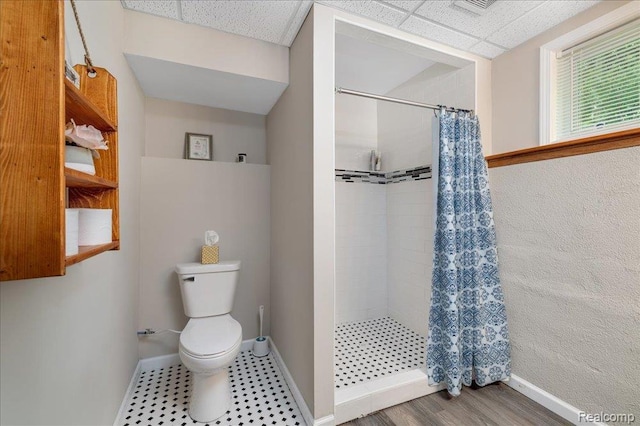 14165 Crampton Rd, Camden, MI 49232 - bathroom featuring a stall shower and a paneled ceiling