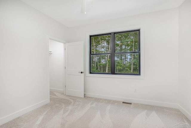 9841 Beech Tree Ln, Frankenmuth, MI 48734 - spare room with carpet and baseboards