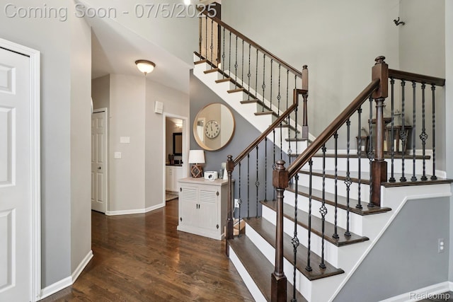 678 Twin Oaks Ct, Rochester Hills, MI 48307 - stairs featuring wood finished floors and a towering ceiling
