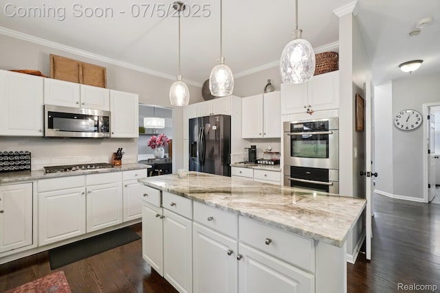 678 Twin Oaks Ct, Rochester Hills, MI 48307 - kitchen with appliances with stainless steel finishes, crown molding, white cabinetry, dark wood-type flooring, and a kitchen island