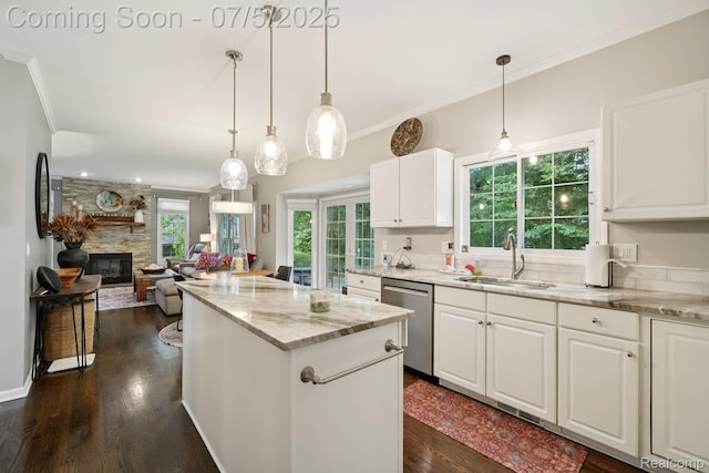 678 Twin Oaks Ct, Rochester Hills, MI 48307 - kitchen featuring stainless steel dishwasher, a kitchen island, dark wood finished floors, light stone countertops, and white cabinets