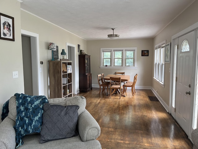 3925 Miramar Ave NE, Grand Rapids, MI 49525 - dining area with hardwood / wood-style floors and crown molding