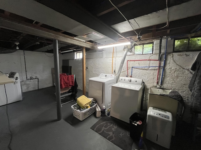 3925 Miramar Ave NE, Grand Rapids, MI 49525 - below grade area featuring separate washer and dryer and healthy amount of natural light