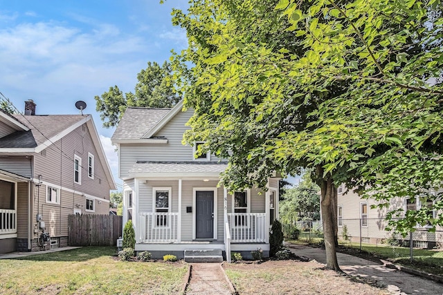 816 Oakhill St SE, Grand Rapids, MI 49507 - view of front of house with a porch and roof with shingles