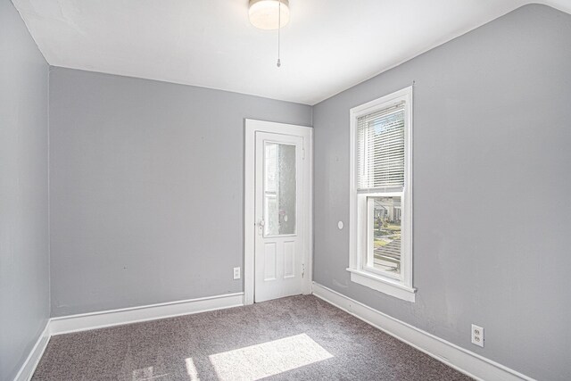 816 Oakhill St SE, Grand Rapids, MI 49507 - carpeted spare room with baseboards