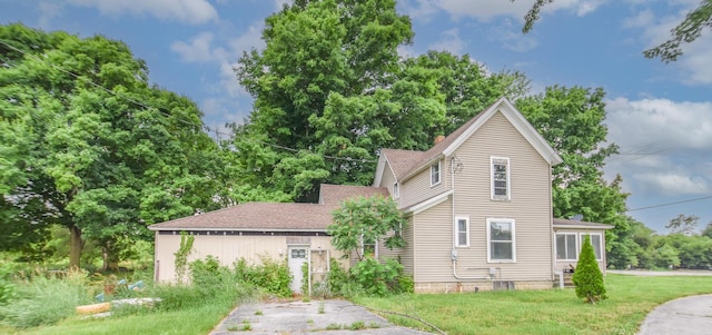 1085 E Chicago Rd Unit A, Quincy, MI 49082 - traditional-style home featuring a front yard