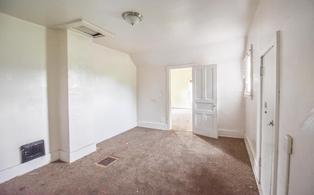 1085 E Chicago Rd Unit A, Quincy, MI 49082 - spare room featuring carpet flooring and baseboards