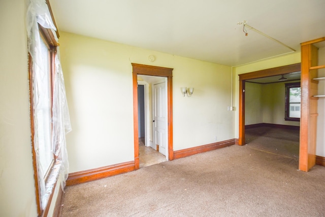 1085 E Chicago Rd Unit A, Quincy, MI 49082 - empty room with carpet floors and a smoke detector