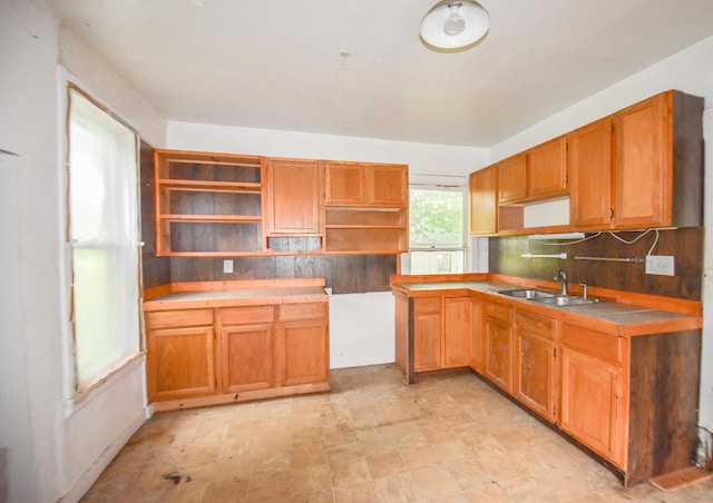 1085 E Chicago Rd Unit A, Quincy, MI 49082 - kitchen with open shelves, tile countertops, and backsplash