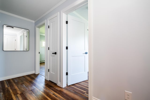 6828 First Ave, Coloma, MI 49038 - hallway featuring dark wood-style floors, crown molding, and a baseboard radiator