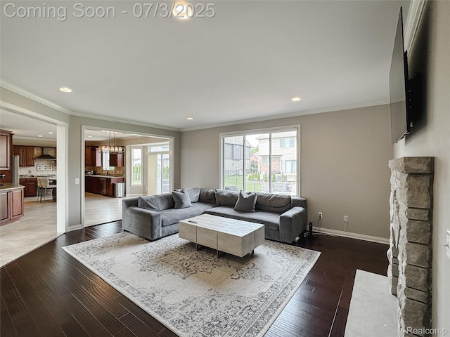 15330 Prentice Ct, Macomb, MI 48042 - living room with ornamental molding, recessed lighting, and light wood-type flooring