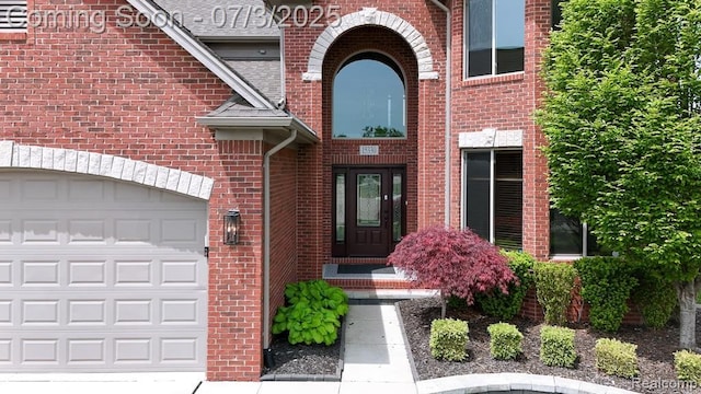 15330 Prentice Ct, Macomb, MI 48042 - doorway to property with brick siding and a shingled roof